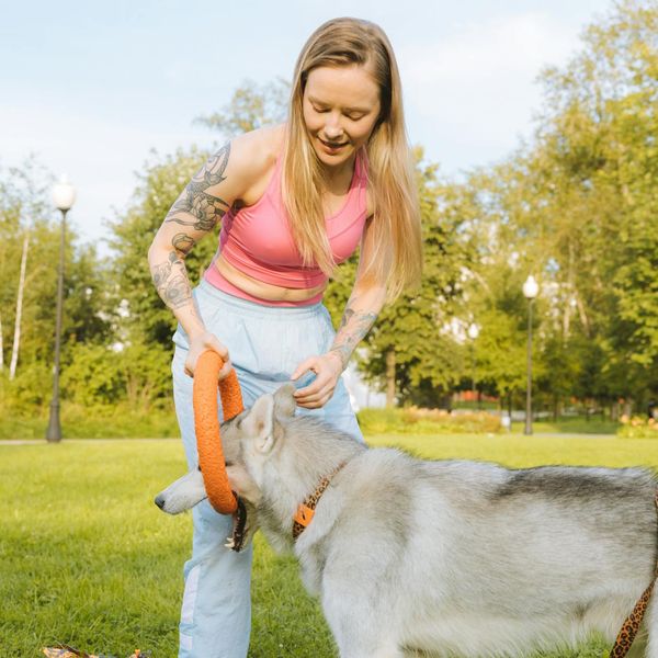 Woman feeling energetic and happy outdoors during light exercise.